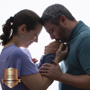 AFNS PRIME Bronze Winner backlit parents with newborn profile